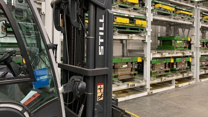 A BlueBotics "blue box" installed in a manual forklift