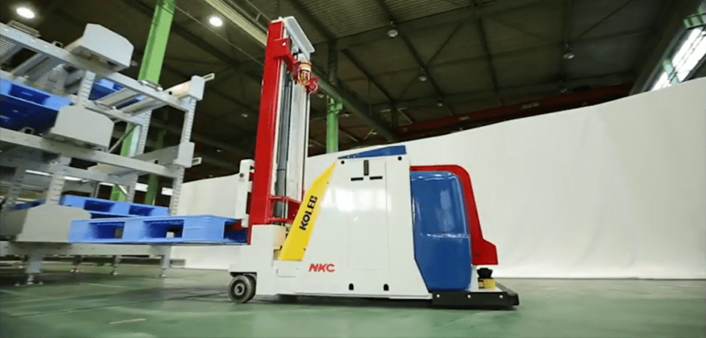 An automated forklift moving pallets